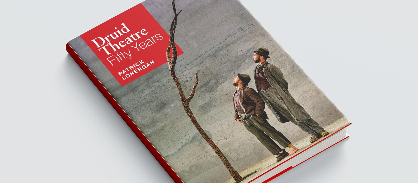 A book on a grey background