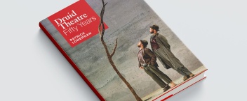 A book on a grey background