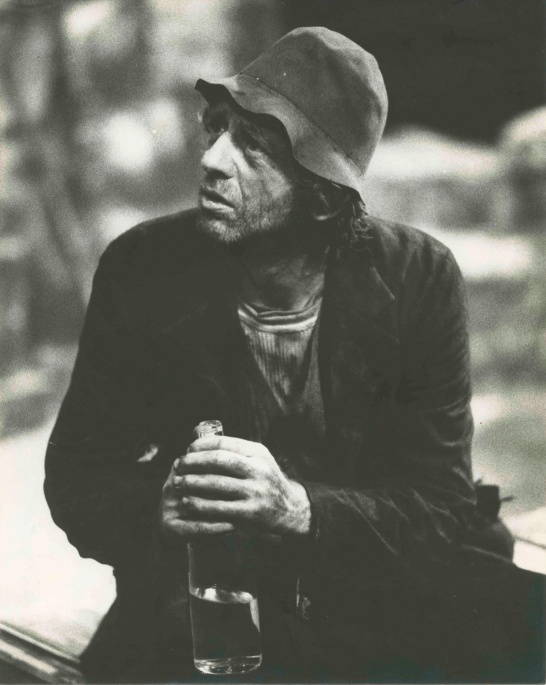 A black-and-white production photo of The Wood of the Whispering by M. J. Molloy featuring Mick Lally as Sanbatch Daly.