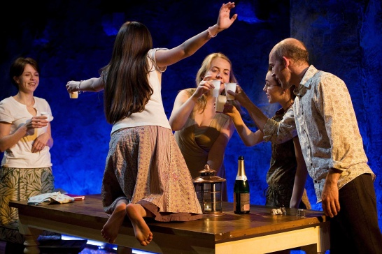 A production photo of Lucy Caldwell's Leaves featuring the family gathered around the table.