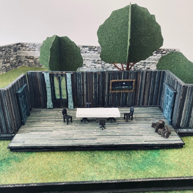 			A model of the breakfast room set from Act 3.