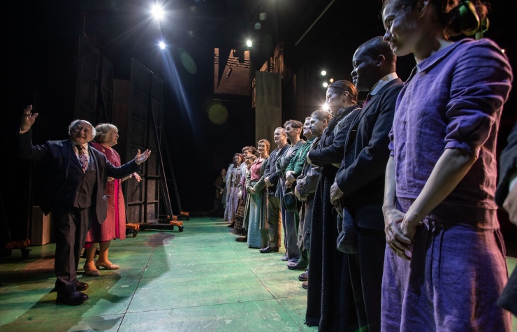 President Higgins and the company of DruidO'Casey on stage at the Abbey Theatre in 2023.